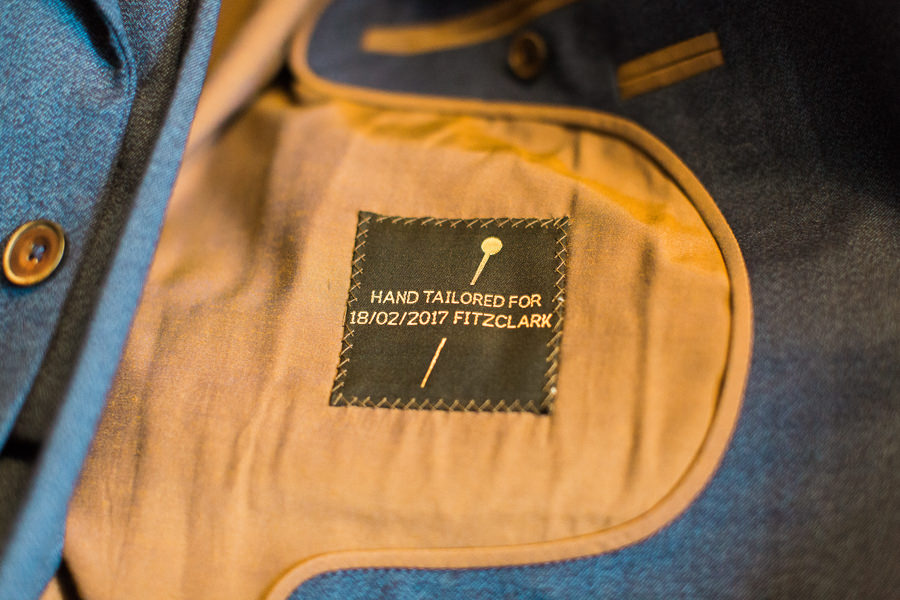 lemore manor same sex wedding fine art photography herefordshire - inner personalisation and details of a groom's jacket - image by hayley morris photography