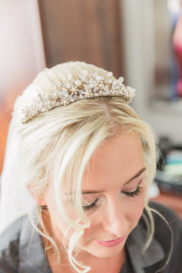 image shows bride having just had her makeup done at puckrup hall wedding photography gloucestershire gloucester tewkesbury fine art documentary photography - image by hayley morris photography 