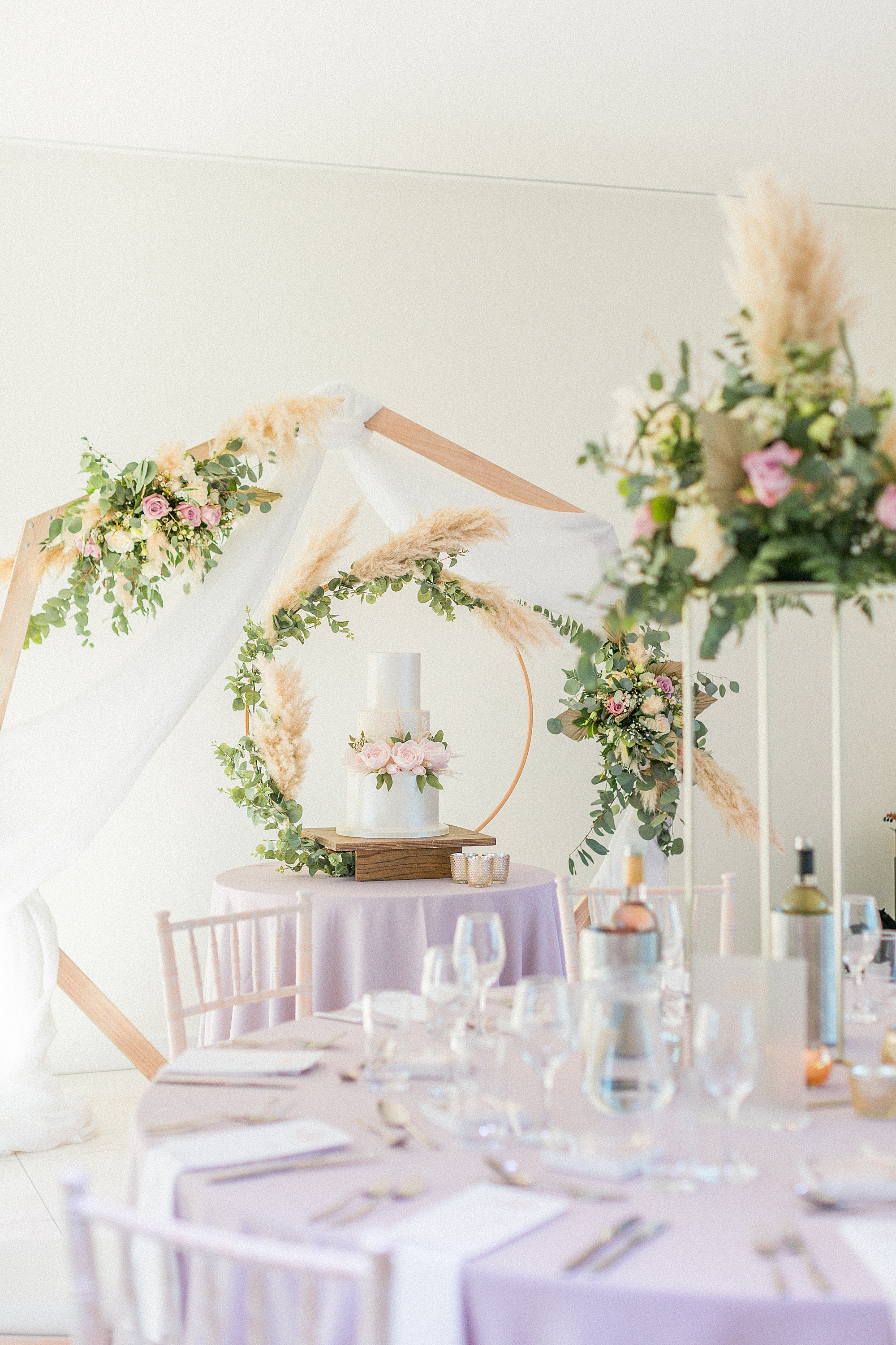 photo of a wedding reception with beautiful styling and elegant cake at arley house worcestershire west midlands