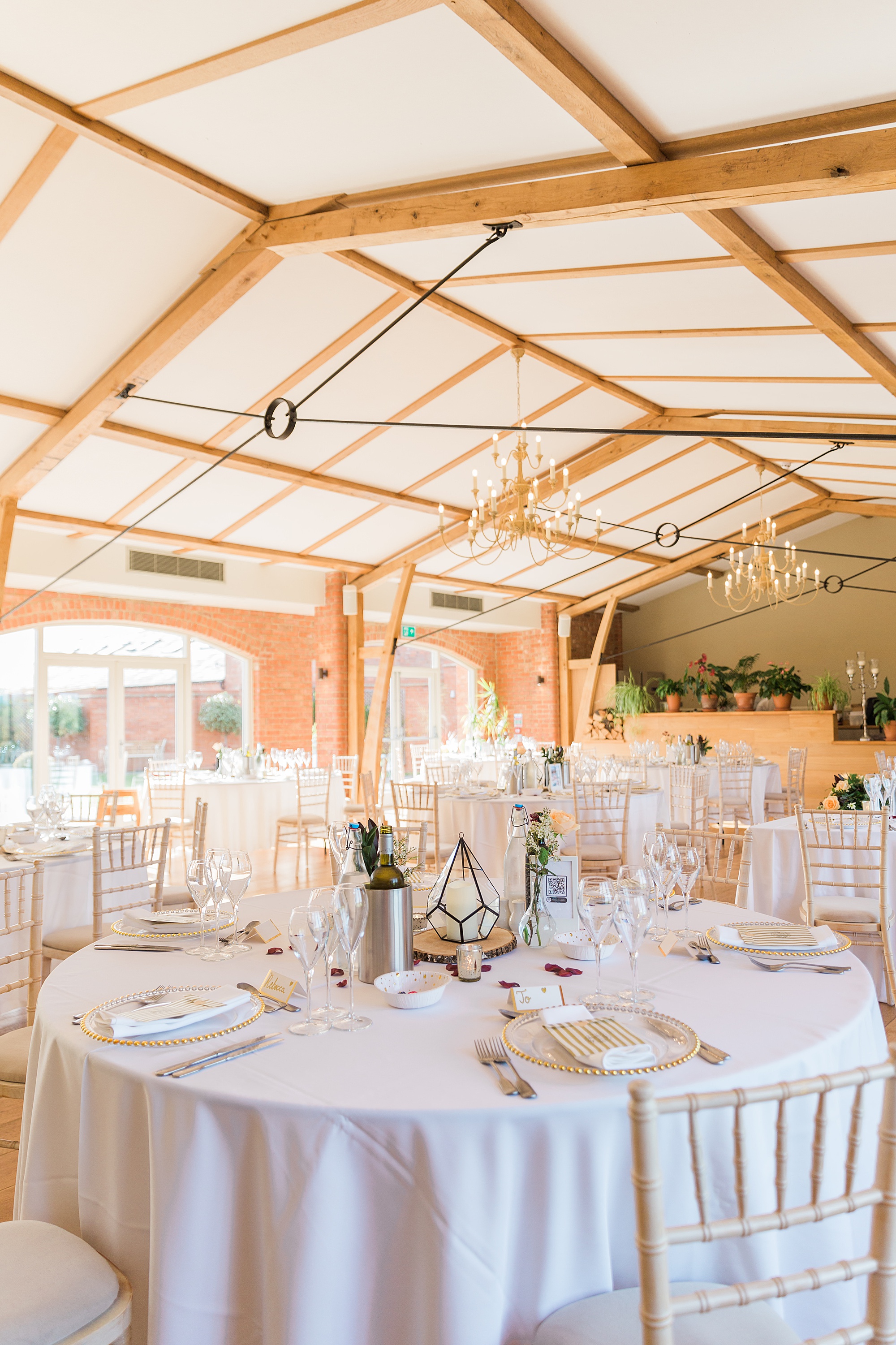 photo of one of the barns styled beautifully for a wedding reception at cider mill barns 