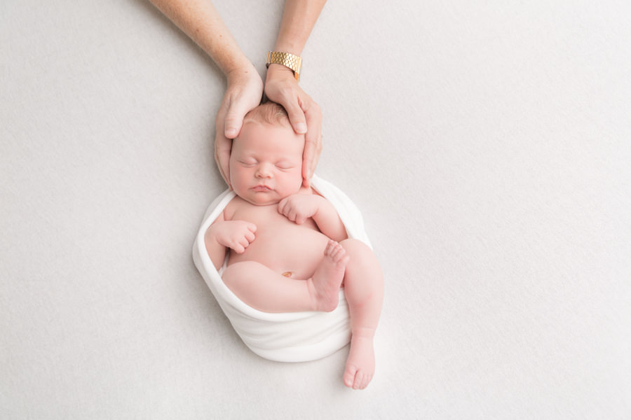 Hayley Morris Photography Newborn Photographer Malvern Worcester - new mums arms around baby
